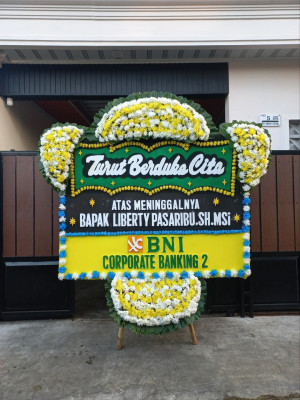 Papan Bunga Duka di Unir Sirau