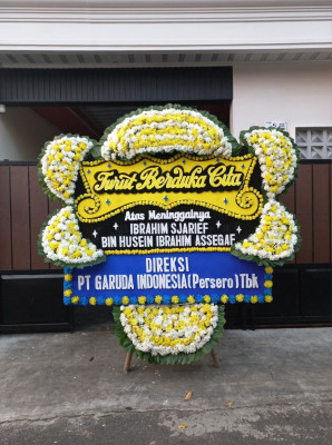 Papan Bunga Duka di Unir Sirau