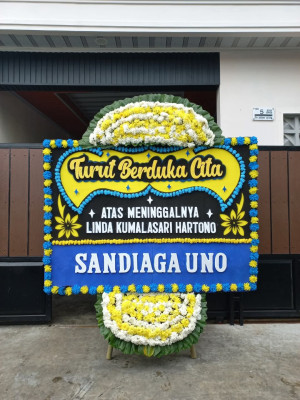 Papan Bunga Duka di Unir Sirau