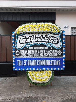 Papan Bunga Duka di Unir Sirau